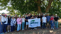 Groups picture under a tree.